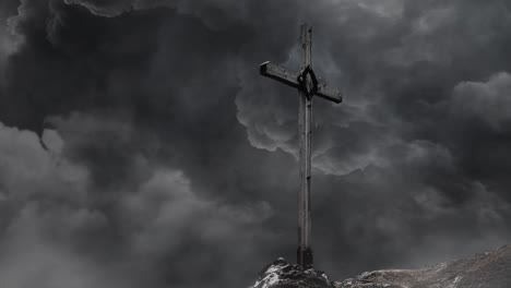 cross on the top of the mountain with storm clouds in the background