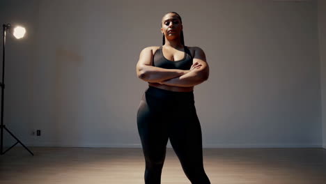 confident plus-size woman in fitness apparel