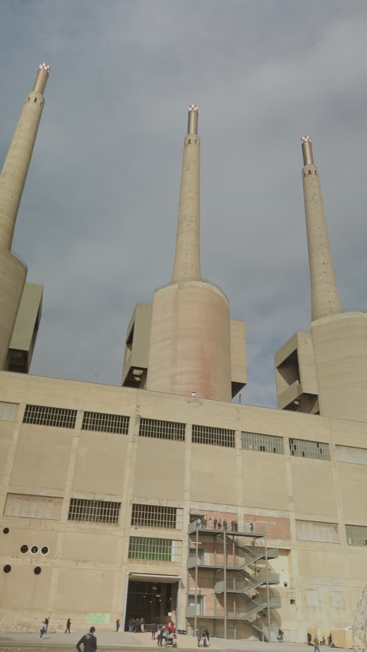 three chimneys industrial towers in barcelona in vertical