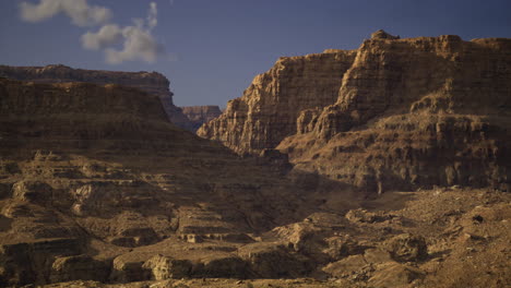 majestic canyon landscape bathed in golden sunlight showcasing rugged cliffs