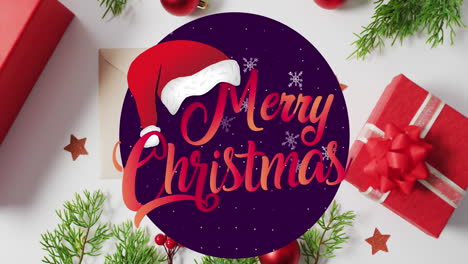 animation of merry christmas text over christmas decorations and envelopes