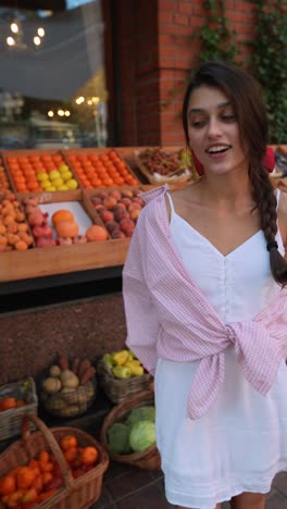 young woman in a fruit market