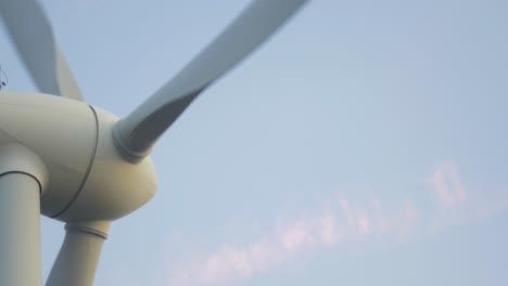 close up windmill spins in slow wind