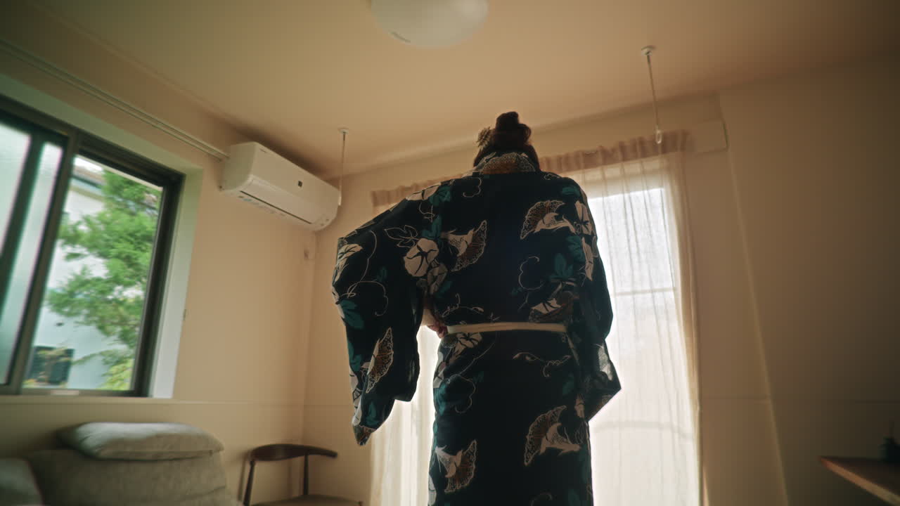 Person in Kimono in a Room