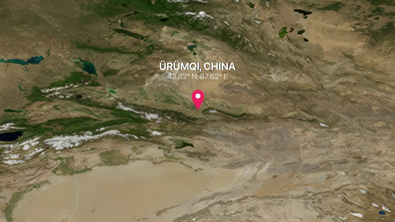 A digital earth render zooms from a global view into Urumqi China with coordinates