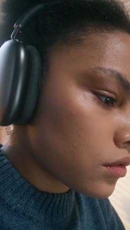 woman listening to music with headphones