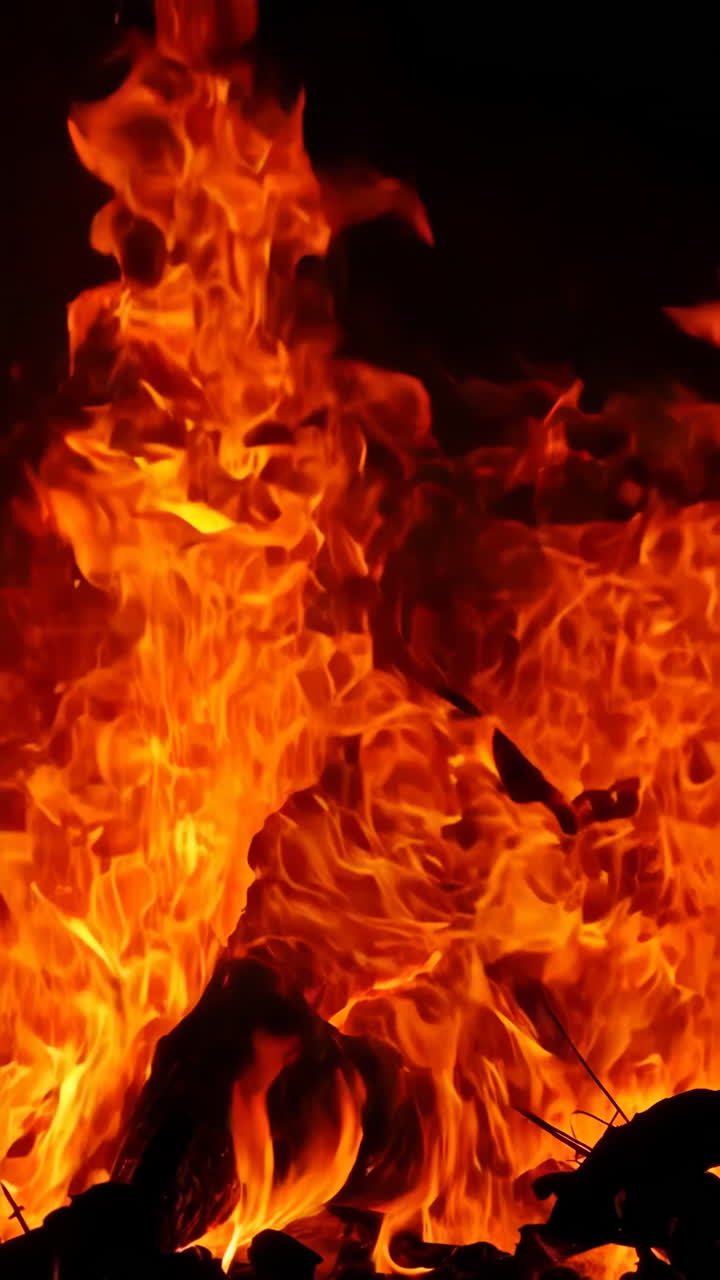 Vibrant Red and Orange Flames on a Dark Background