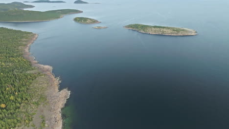 Serene-Blue-Sea-And-Lush-Forest-Island-In-​​Sweden