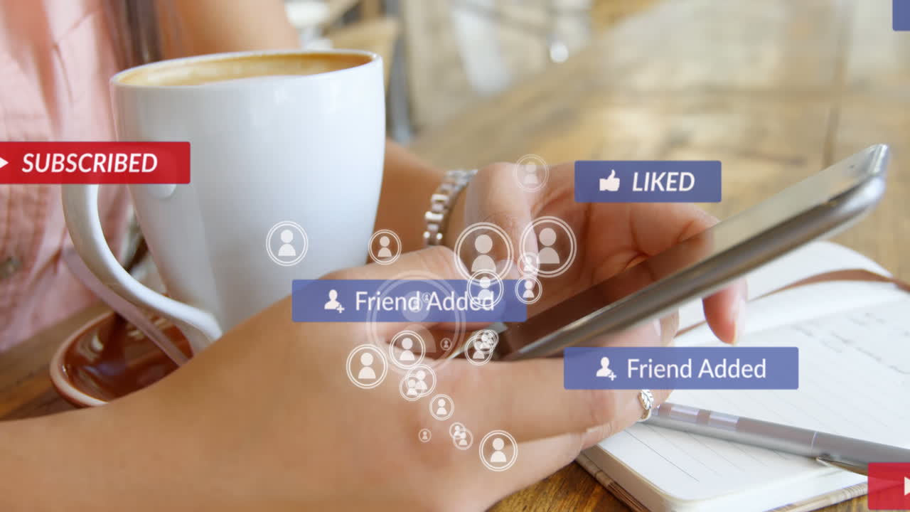 Animation of falling social media icons over women using smartphone