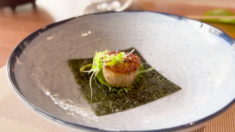 vegan scallop ｍushroom seaweed dish at fine dining restaurant