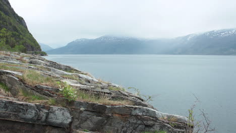 An-amazing-view-of-a-calm-in-a-cloudy-day-with-endless-horizon-and-lonely-figures-in-the-distance