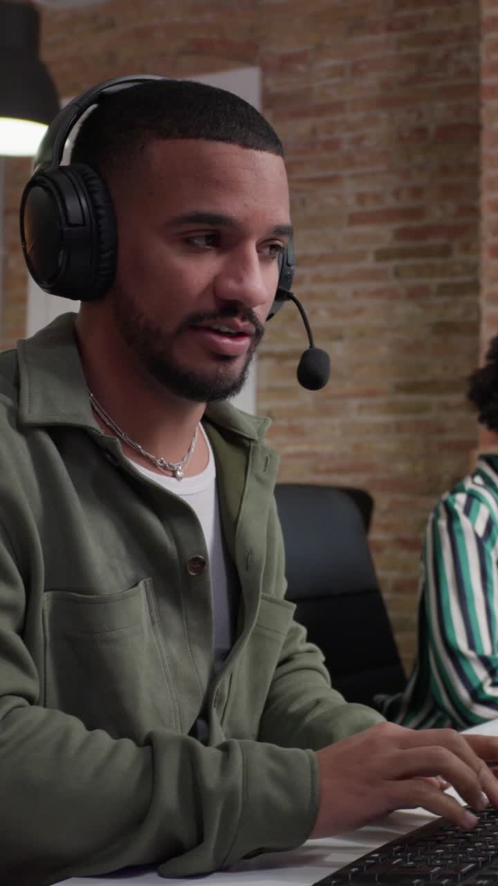 Man working with a headset in an office