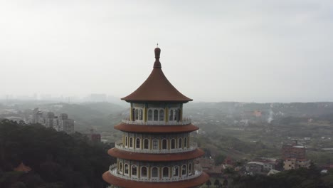 Dolly-out-view-of-the-temple---Experiencing-the-Taiwanese-culture-of-the-spectacular-five-stories-pagoda-tiered-tower-Tiantan-at-Wuji-Tianyuan-Temple-at-Tamsui-District-Taiwan