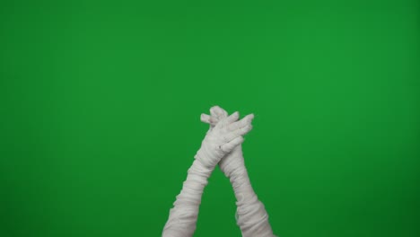 mummy or ghost hands gesturing on green screen