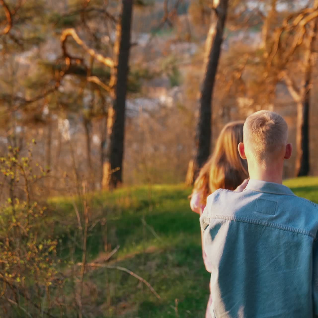 Romantic couple on nature. Happy couple walking along path in countryside together