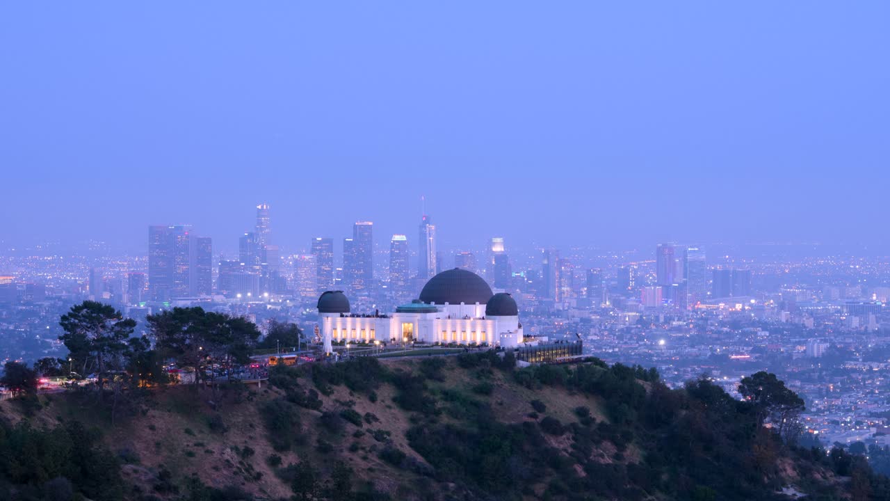 Hyperlapse from day to night at Griffith Observatory, overlooking downtown Los Angeles. A cinematic transition captures shifting light, skyline glow, and the timeless elegance of LA’s view