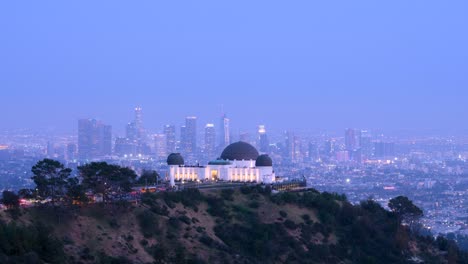 hyperlapse from day to night at griffith observatory, overlooking downtown los angeles. a cinematic transition captures shifting light, skyline glow, and the timeless elegance of la’s view