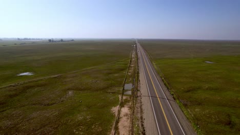 long empty roadway in central california aerial near mercer california