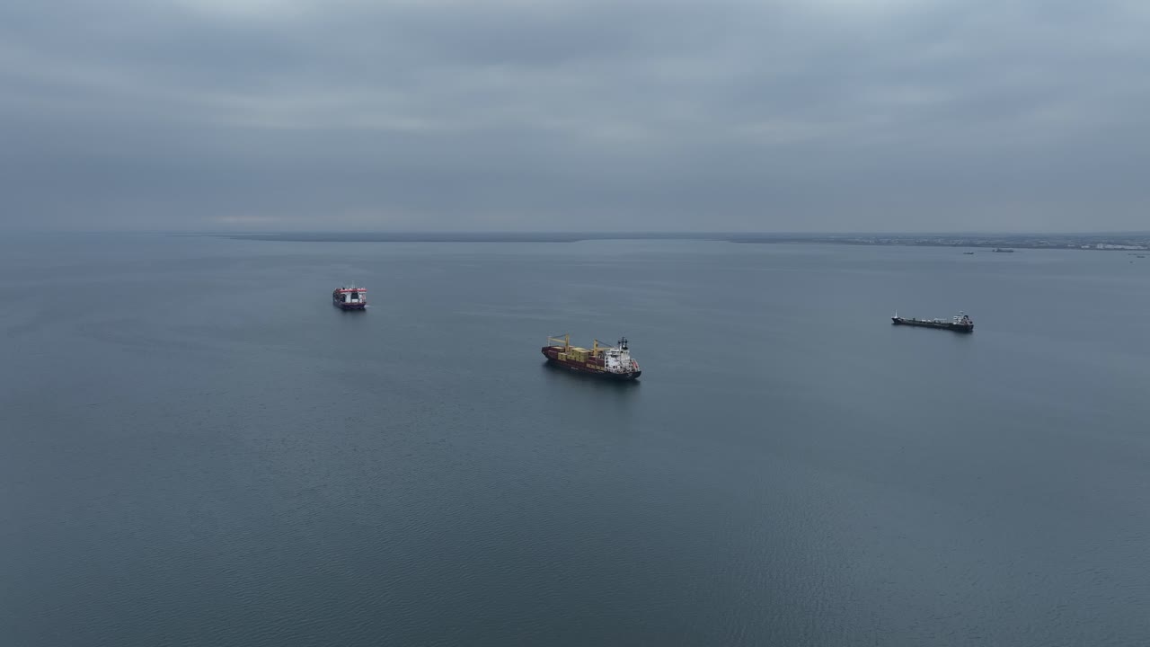 Orbit over crane ships near the port in the city of Thessaloniki, Thermaic Gulf, Greece.