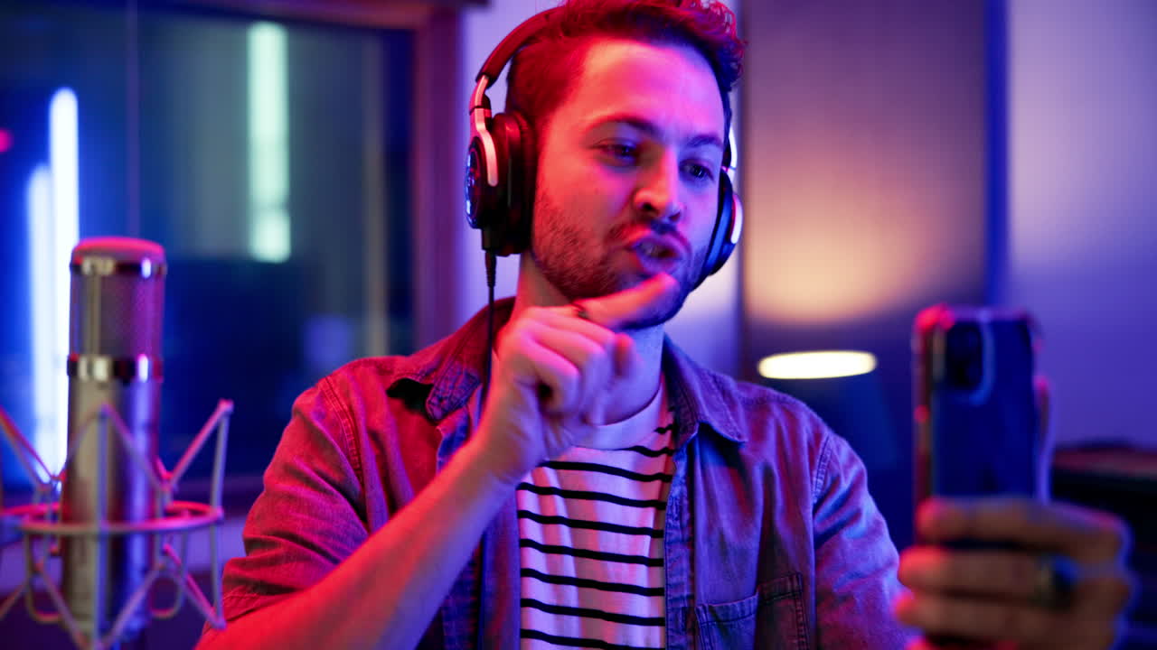 Man recording podcast in studio