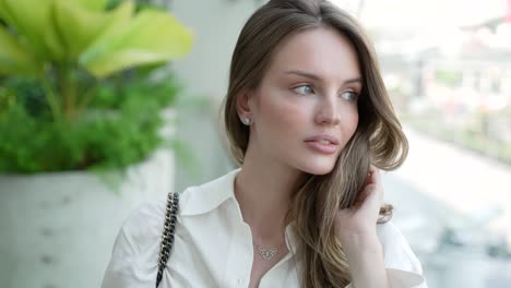 stylish woman in a white shirt