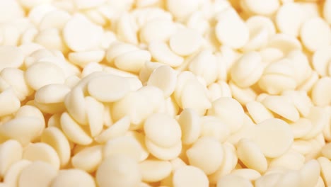 white chocolate chips cascading and piling up