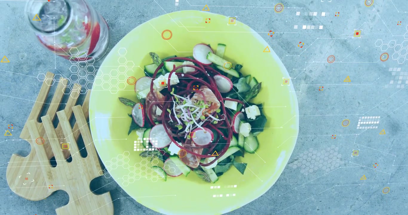 Camera pulling back, revealing yellow salad bowl on tabletop, overlays tagging salad for food ads