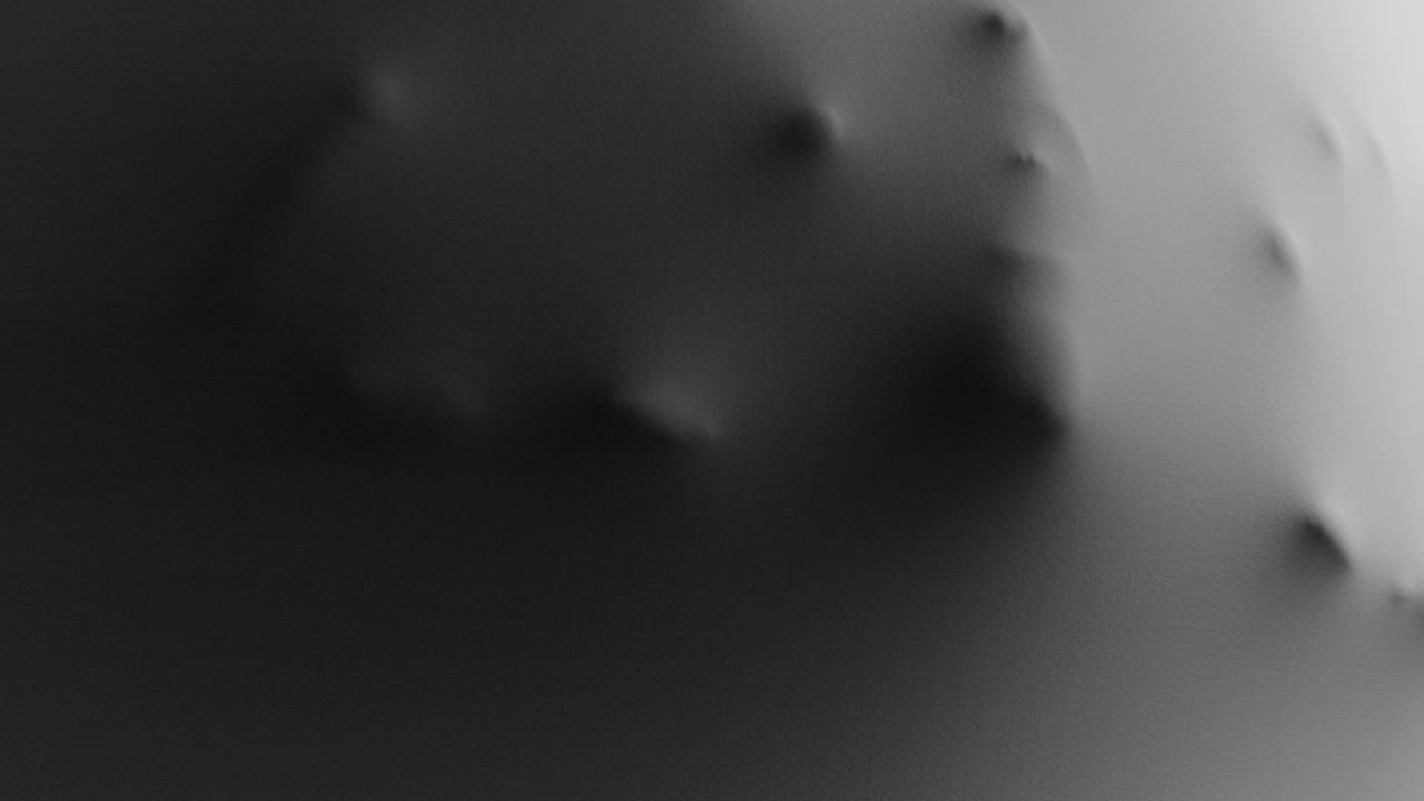 A scary face and hands appear from the white surface