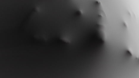 a scary face and hands appear from the white surface