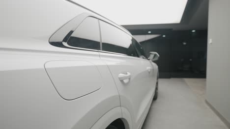 white suv in a showroom