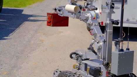 dangerous box of explosives handled by a robot