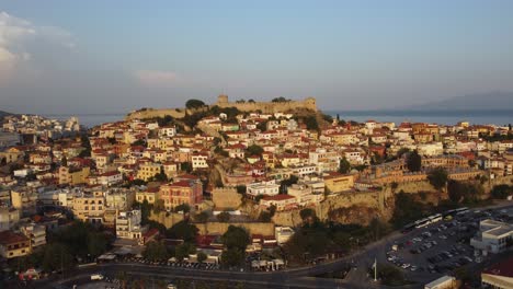 aerial ascend over fortress with traditional architecture in kavala, greece