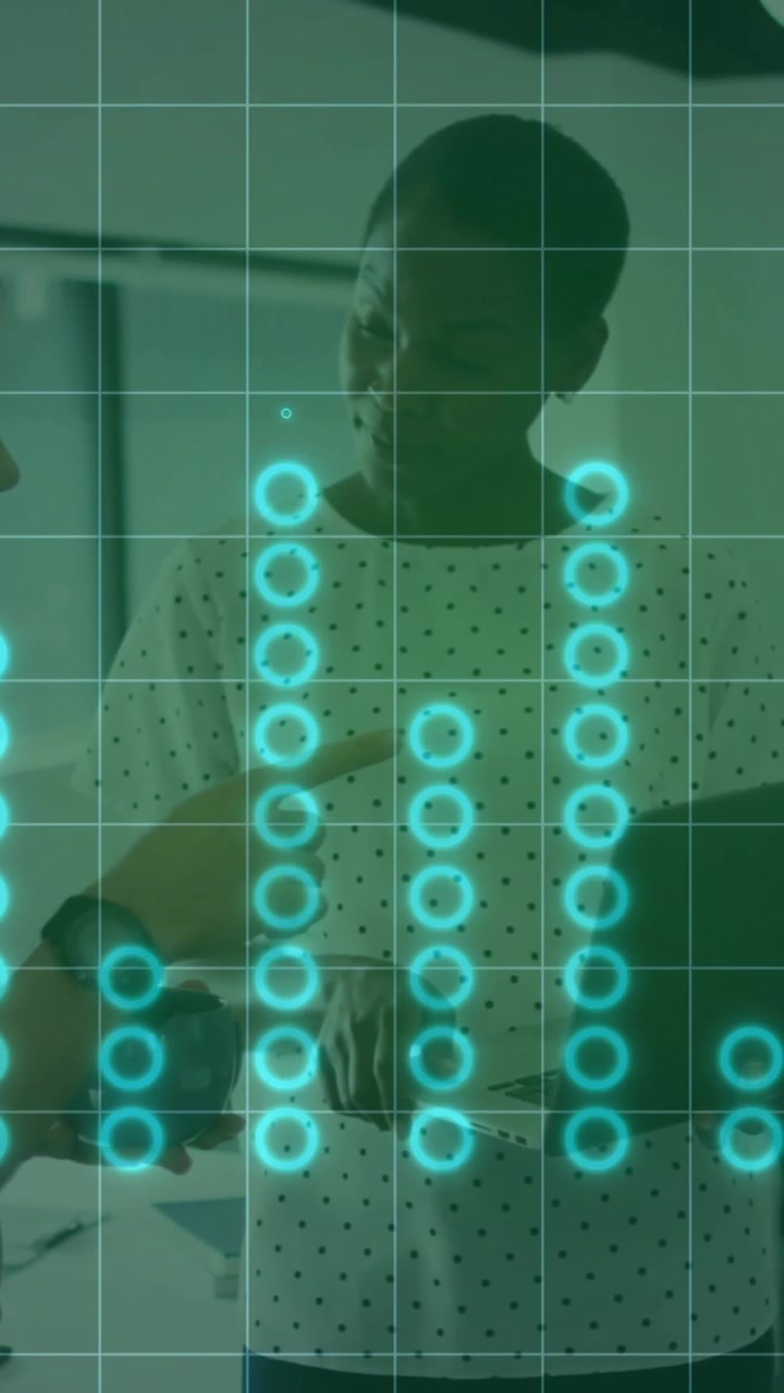 Animation of financial data processing over diverse colleagues discussing work in office