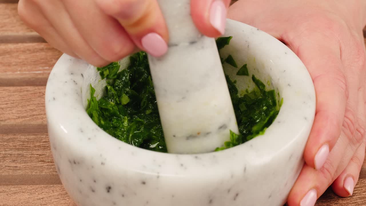 Preparing Herbs with Mortar and Pestle