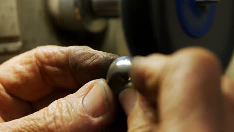 goldsmith polishing ring in workshop 4k