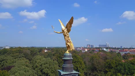 Wonderful-aerial-top-view-flight-Gold-Angel-of-Peace-column-City-town-Munich-Germany-Bavarian,-summer-sunny-cloudy-sky-day-23