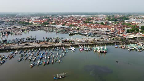 
A-bustling-fishing-port,-besieged-by-severe-water-pollution-from-nearby-factories,-poses-a-grave-danger-to-the-environment-and-livelihoods