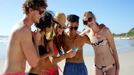 friends taking a selfie on the beach