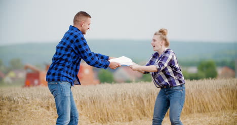 angry farmers quarreling on field