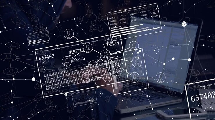 Person som jobber på bærbar PC med digitalt datanettverksoverlegg