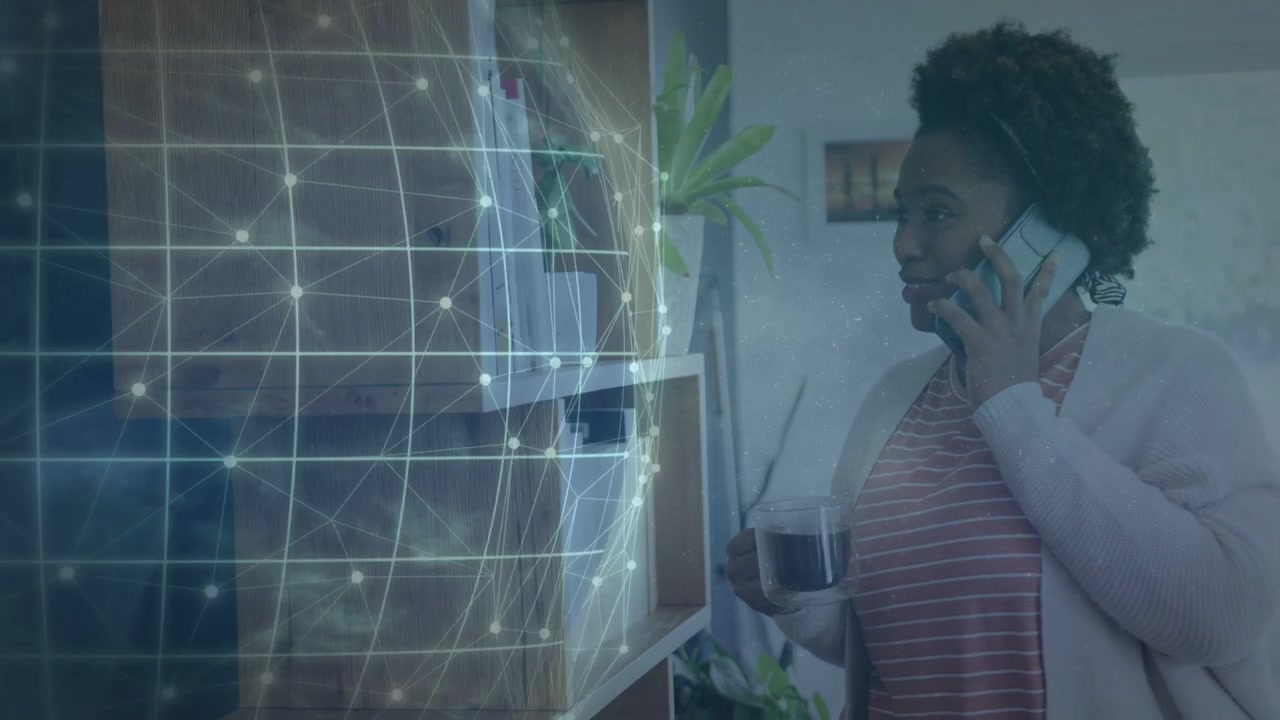 Woman holding mug, talking on phone, call starting tech globe grid shifting pulsing over shelf