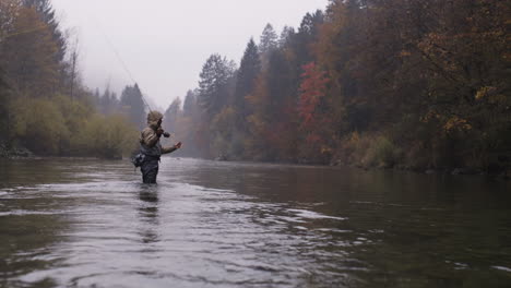 fly fishing in autumn fog