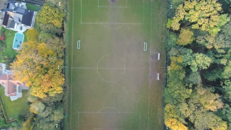 top down view of empty sports soccer field in the luxury residential park