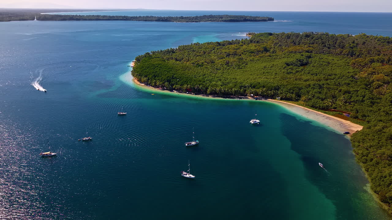 Luxury Boats Sailing Near Isla Colon In The Caribbean Sea At Bocas del Toro Province In Panama, Central America. Aerial Drone Shot