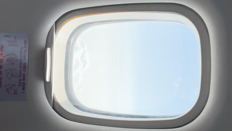 Vertical-shot-of-Airplane-Window