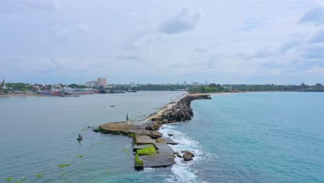 Breakwater-pier-and-port-in-background,-Sans-Souci-in-Dominican-Republic
