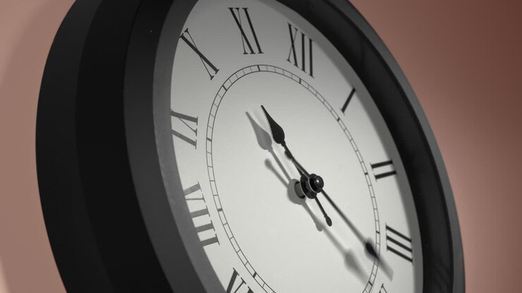 Latin Clock Face on Cream Beige Wall