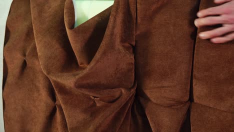 close-up view of brown fabric draped