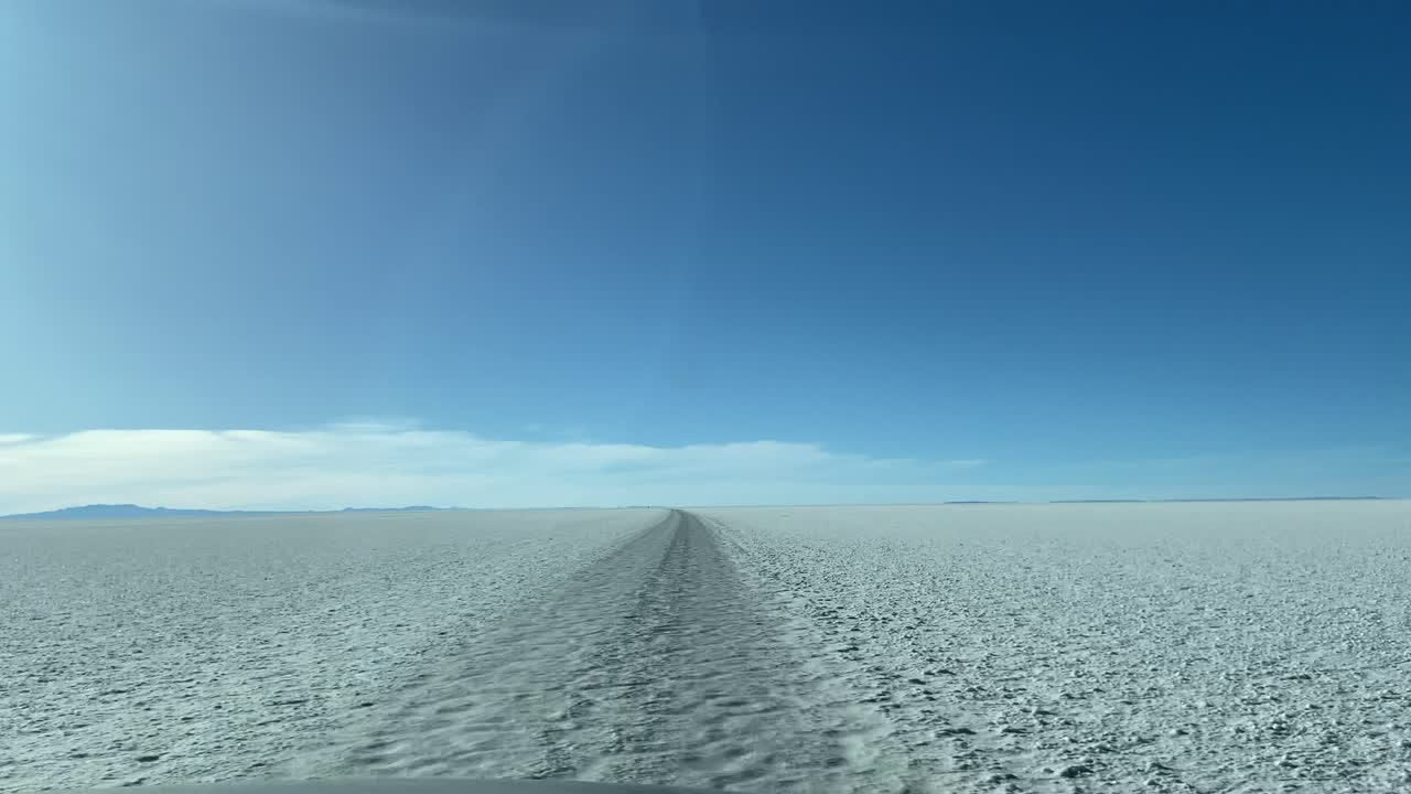 Uyuni Salt Flat Bolivia dry prehistoric lake white landscape car ride POV South America