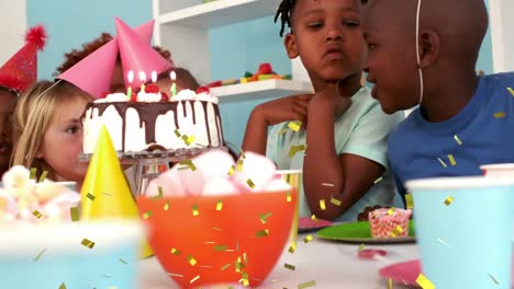 Animation-of-confetti-over-children-at-birthday-party